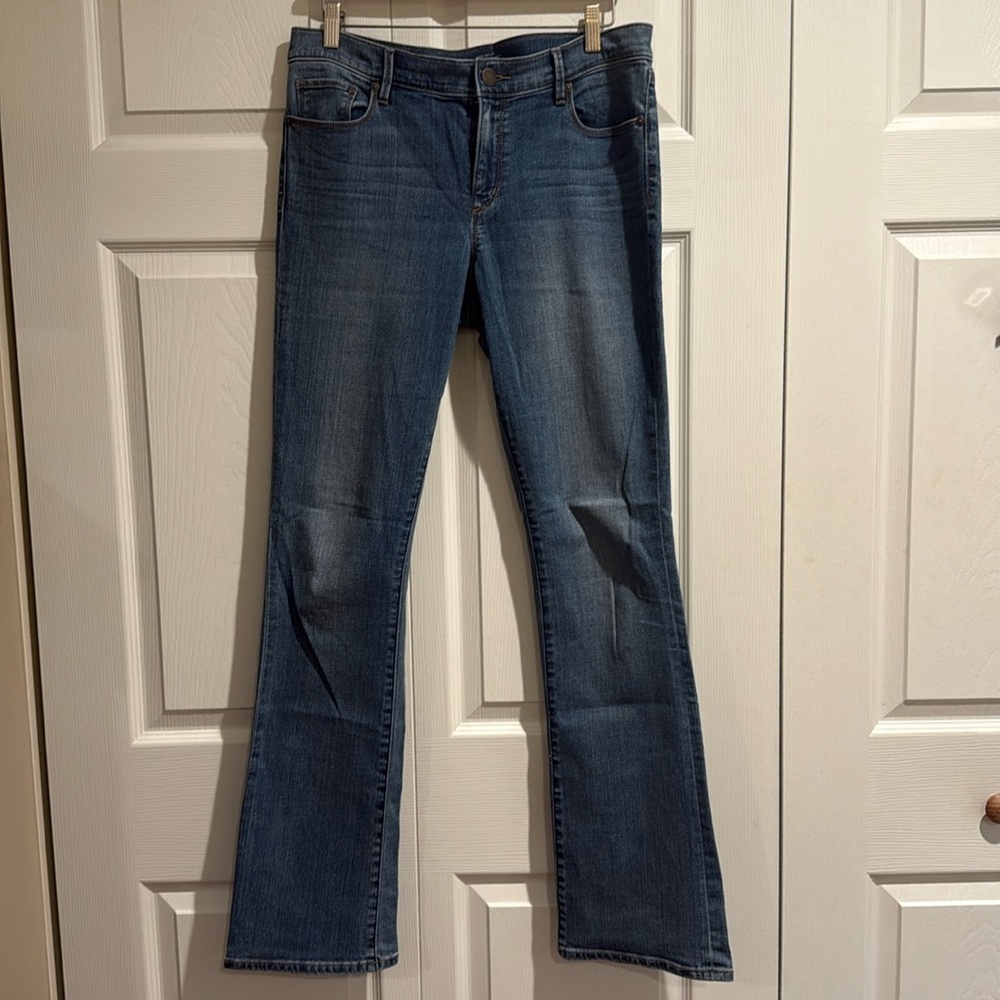 Loft Modern bootcut jeans, stretchy, 92% cotton, 7% polyester, 1% spandex.
